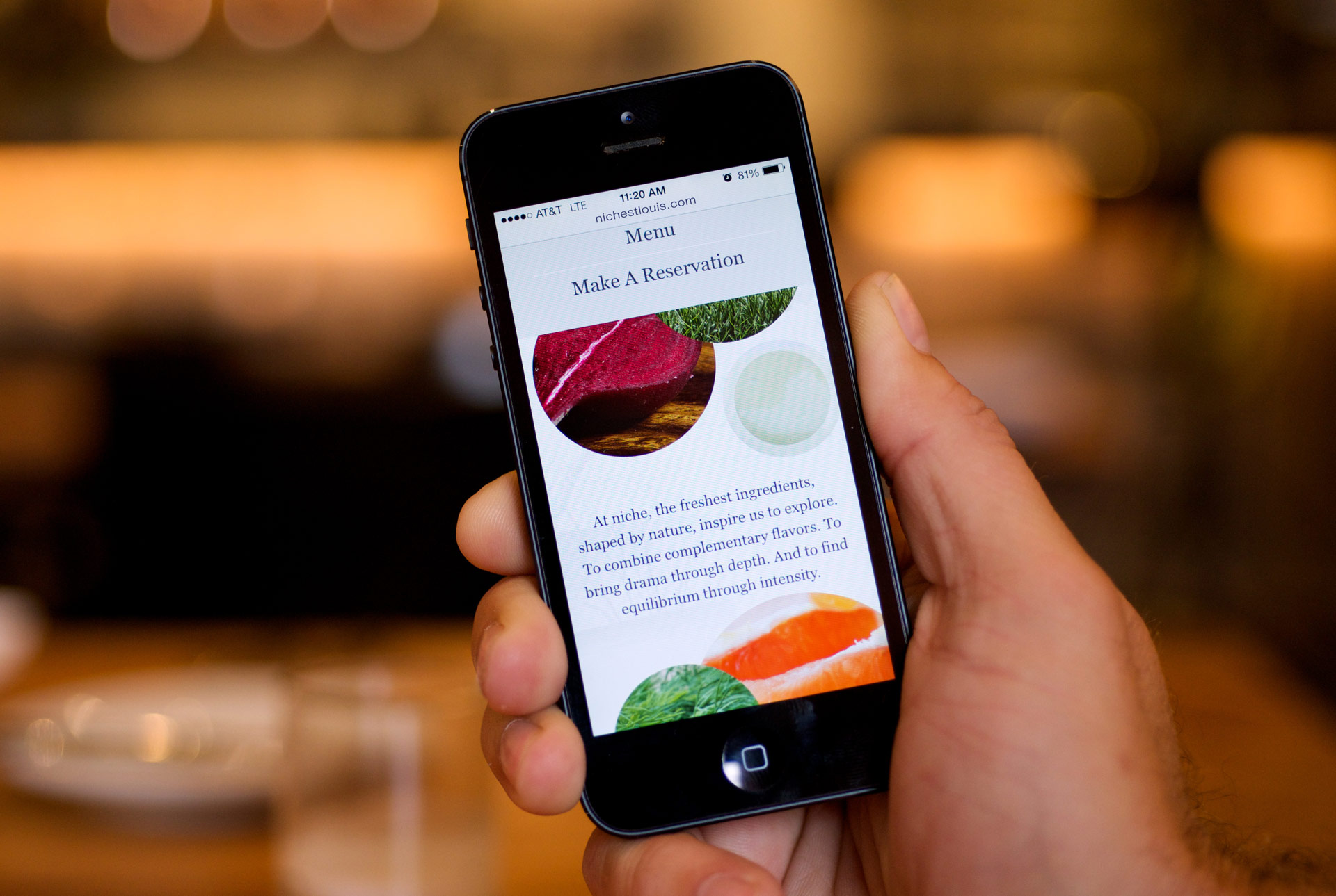 Niche Restaurant's website on a mobile phone