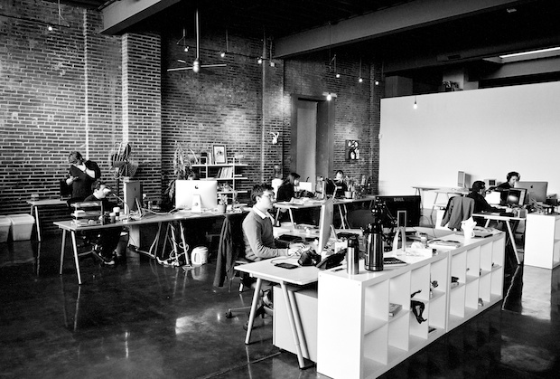 Designers, writers and developers working at Atomicdust - Branding and Design Agency in St. Louis