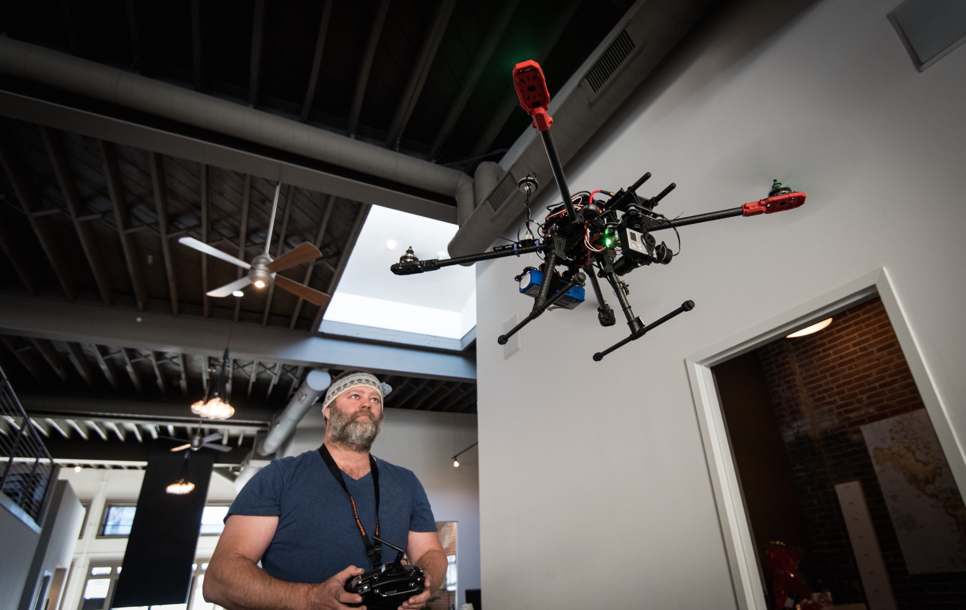James Dixson operating a drone at Atomicdust