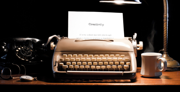 Typewriter with the word 'Creativity' printed on a sheet of paper