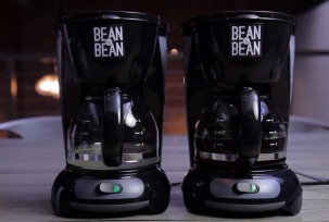2 Coffee Makers lined up on a table, each with a Bean vs. Bean logo