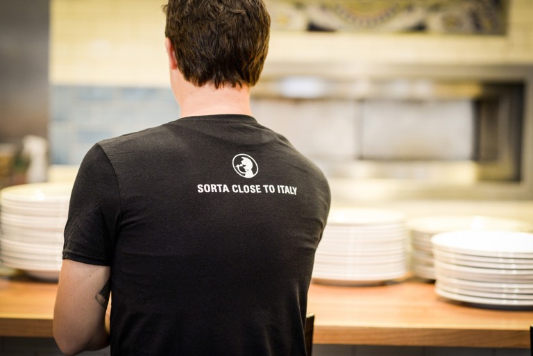 Branding and tagline on the uniforms at Pastaria