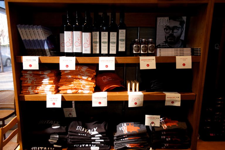 Shelves of branded merchandise at Pastaria Restaurant