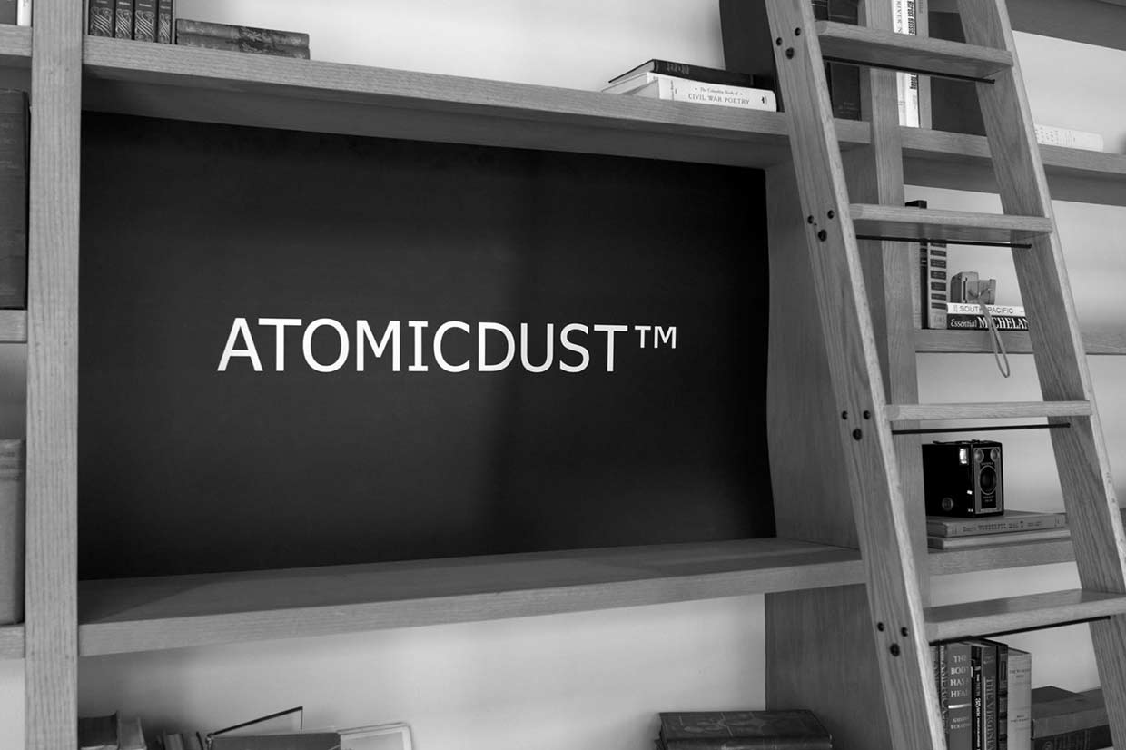 The Atomicdust logo on the bookshelf in their lobby