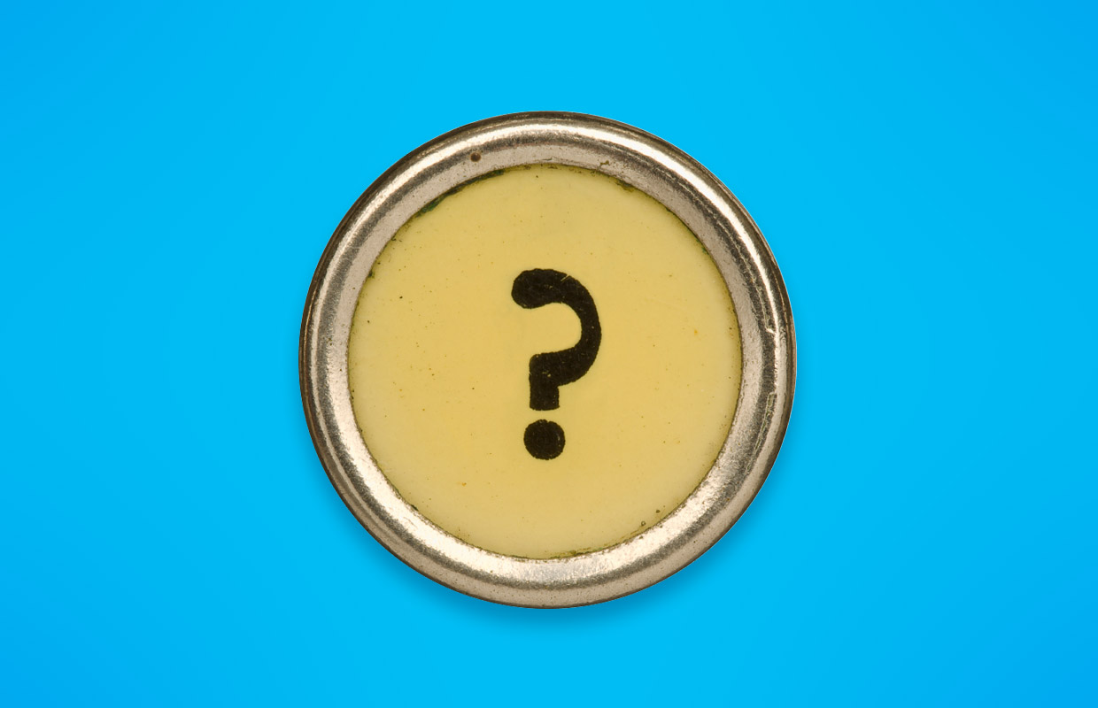 A question mark on a metal ring