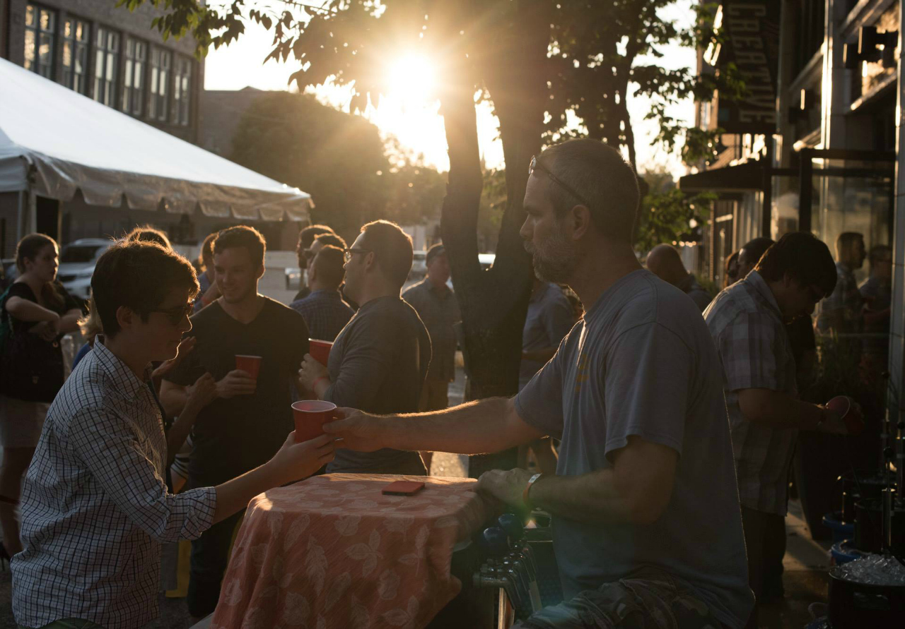 Happy crowd at the Atomicdust Midtown Alley Agency BBQ