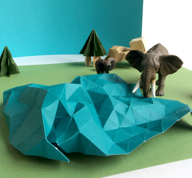 Origami and toy animals were used to create the design for the St. Louis Zoo Annual Report