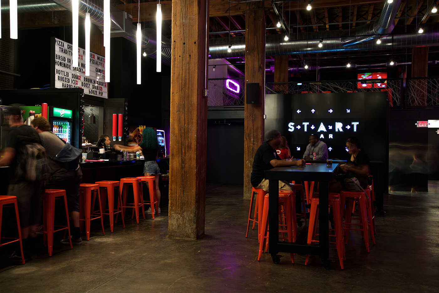 The elements of the Start Bar brand come together in the environment