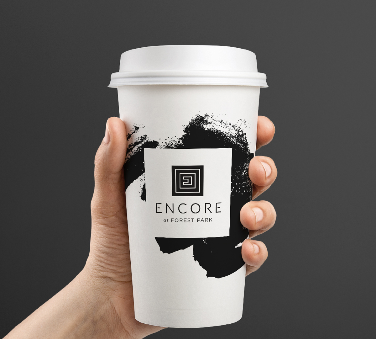  Encore at Forest Park branded coffee cup