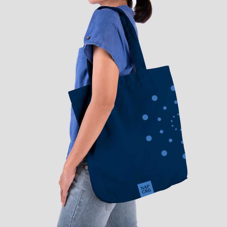 Visual branding with NAPCRG logo and brand mark on tote bag