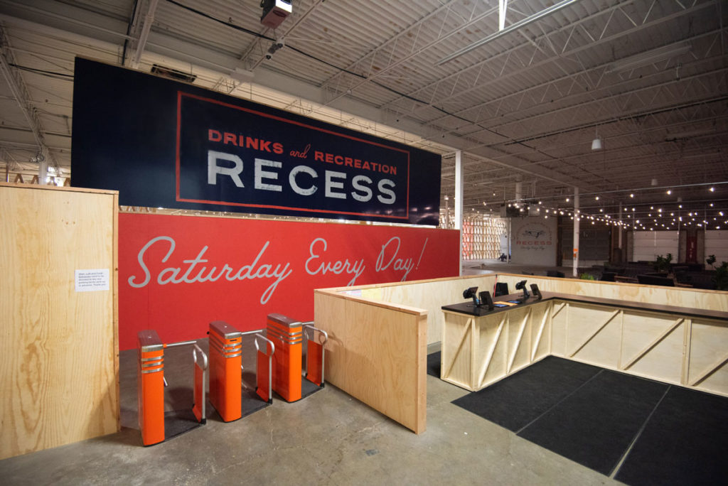Recess branding front walls with the tagline "Saturday Every Day"