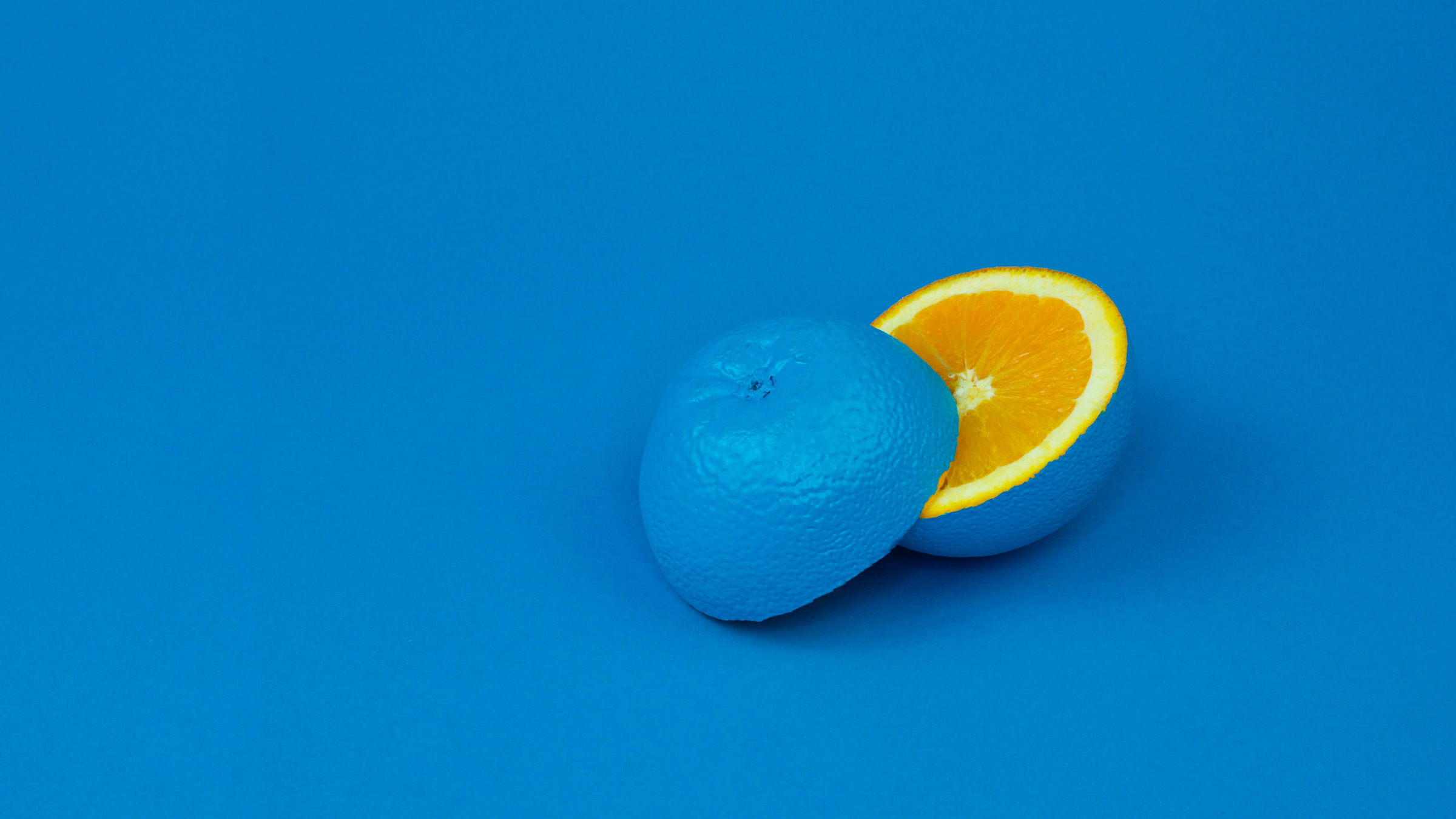 Blue paint camouflages an orange, indicating the importance of color in design accessibility