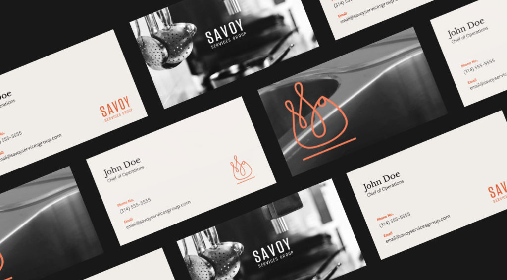 Mockups of Savoy's business cards featuring the new branding