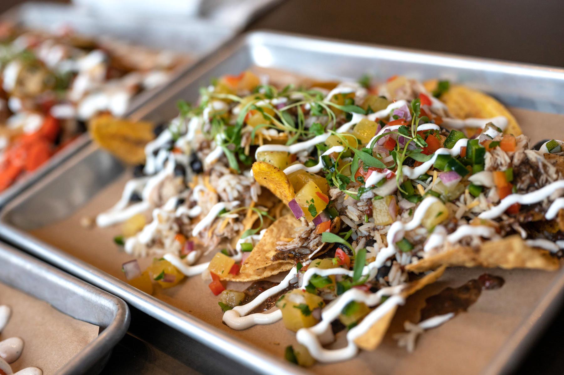 Loaded Nacho's menu includes Jamaican Jerk nachos, crab rangoon nachos and more