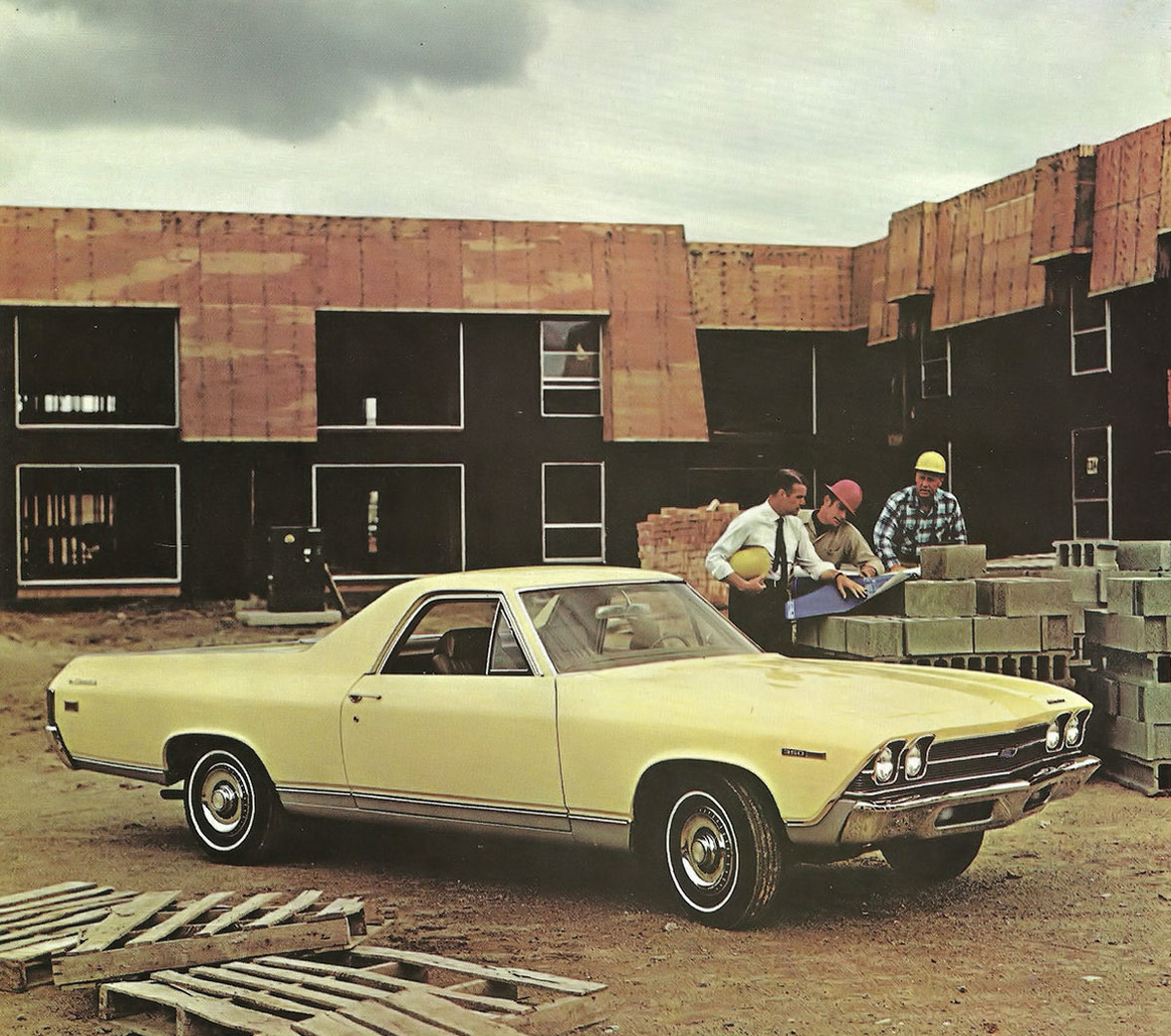 Vintage Chevy El Camino with construction workers in the background