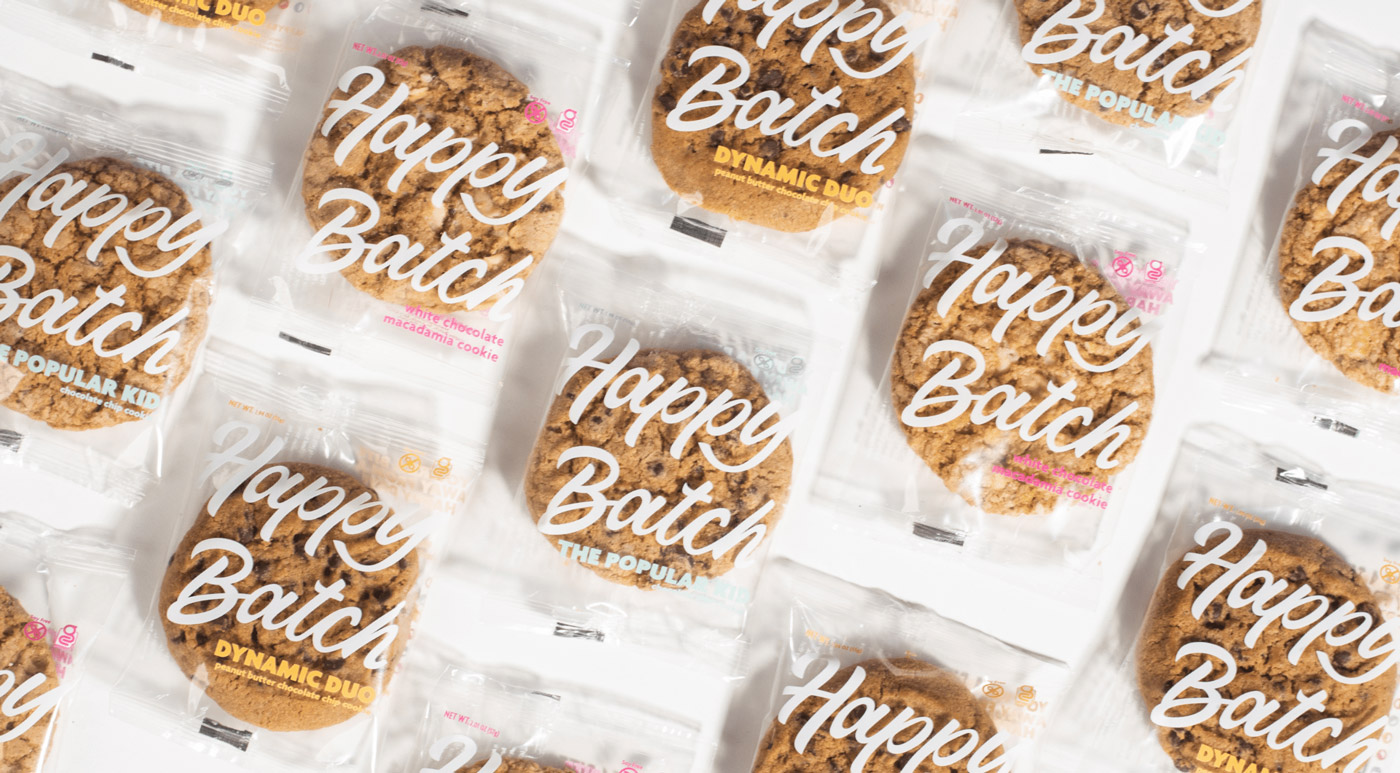 Tons of Happy Batch cookie packaging designs lined up