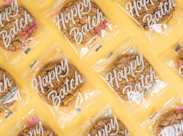 Happy Batch cookies packaging design against yellow background