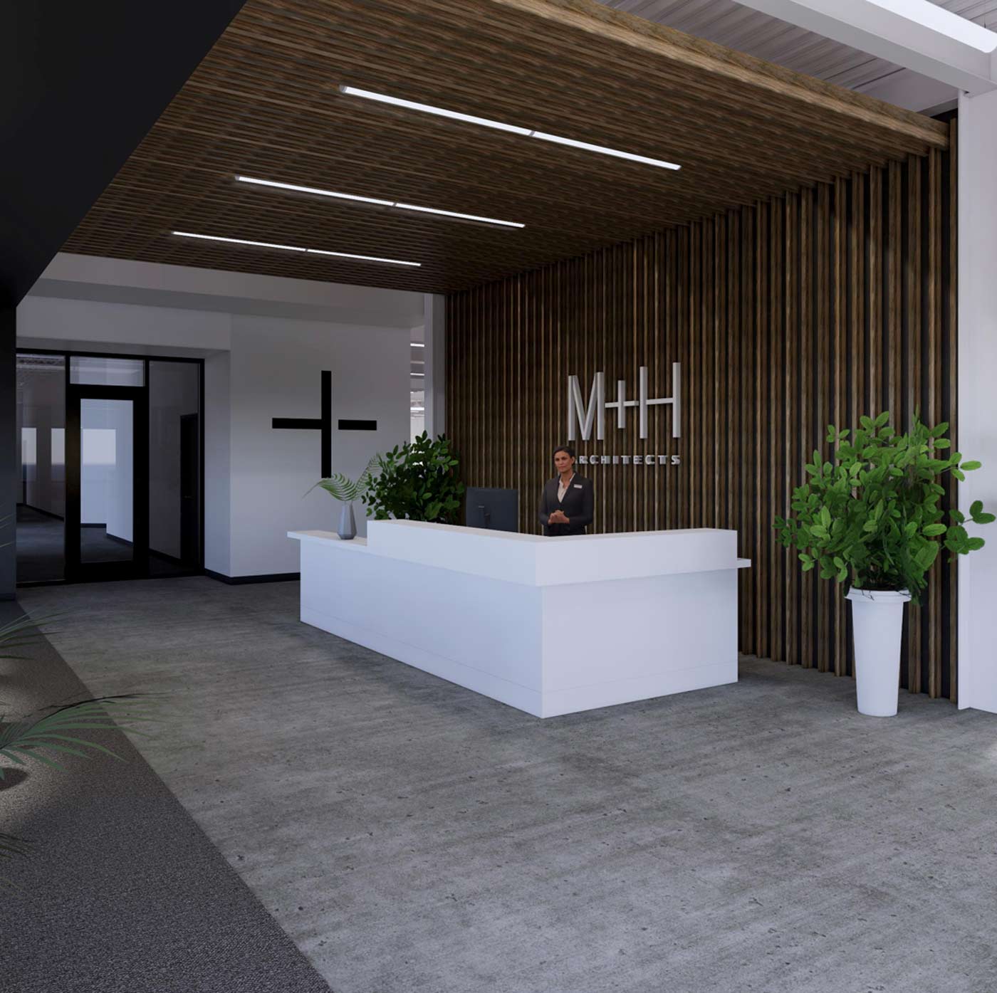 A mockup of the new M+H office with the logo behind the receptionists desk