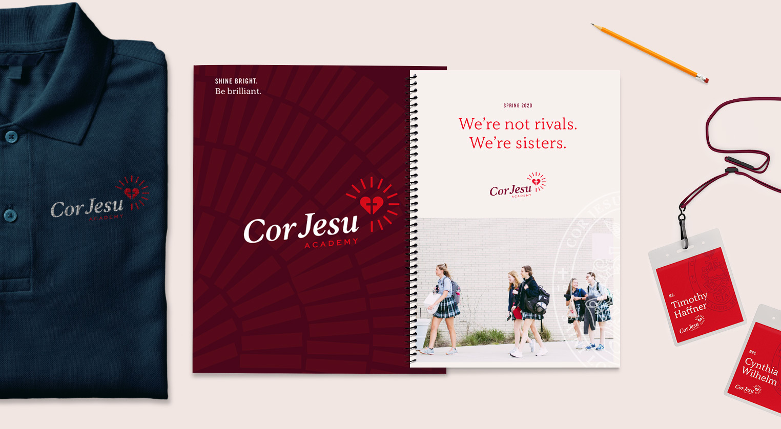 Cor Jesu Academy branding on planners, folders and name tags