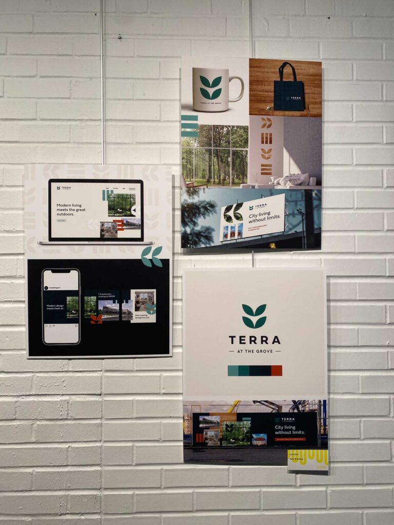 The Terra brand identity is displayed at the AIGA St. Louis Design Show