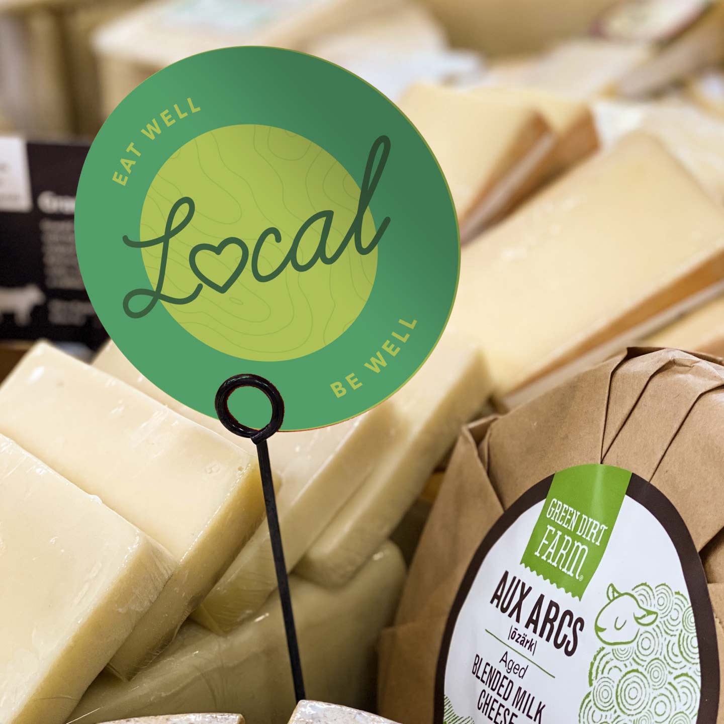 Grocery store signage using the eatwell branding