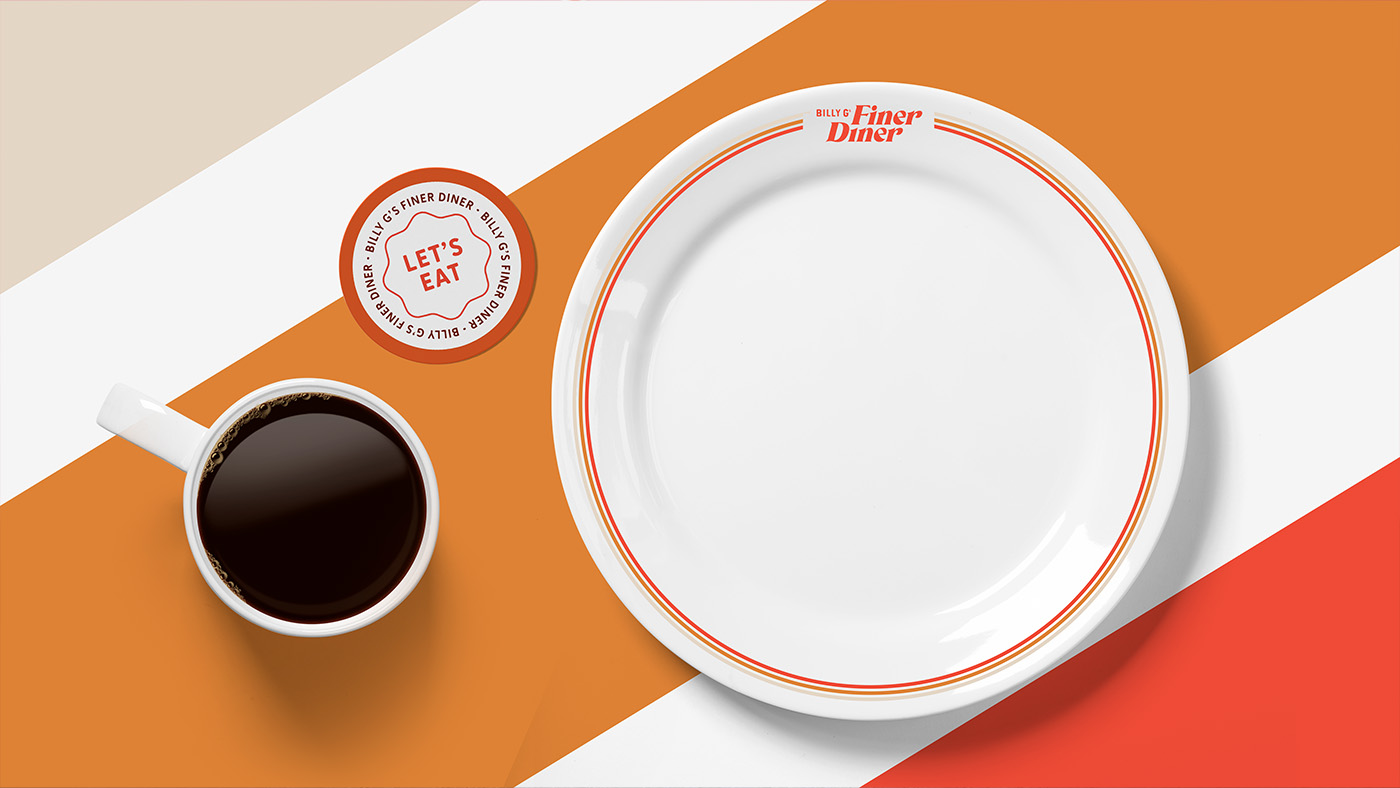 Billy G's Finer Diner branding on dinner plates and coasters