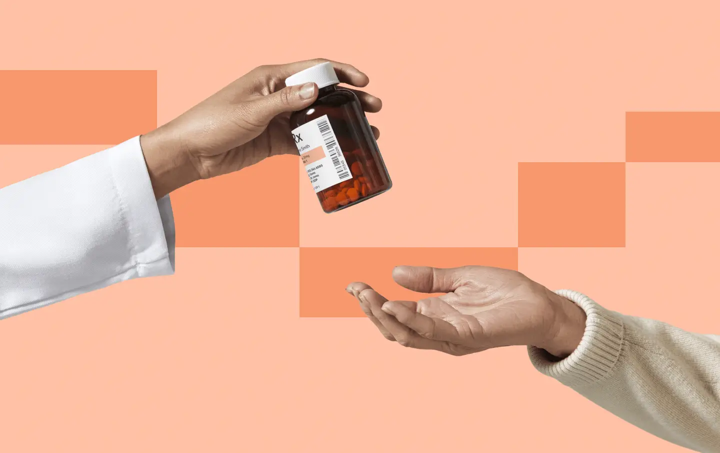 A doctor hands a prescription to a patient