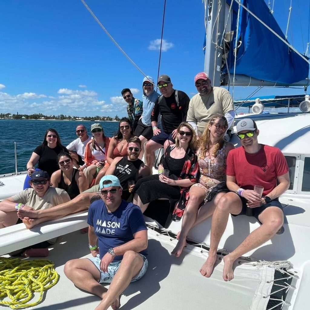 Atomicdust team enjoying a catamaran cruise in Mexico
