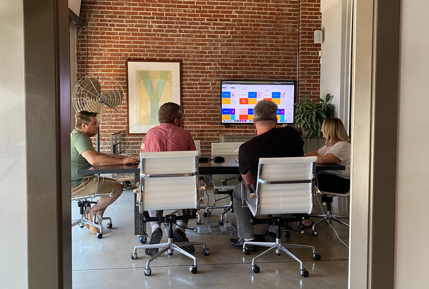 Atomicdust team members working on the All Pet Card brand identity