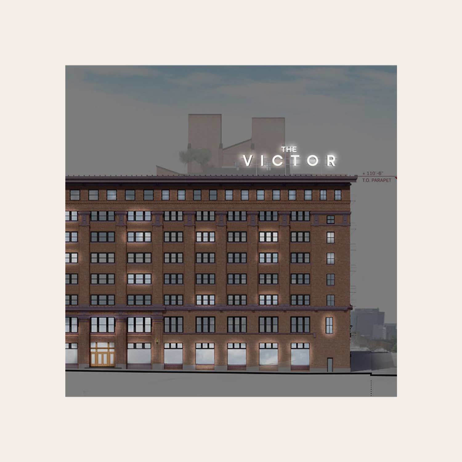 The Victor residential development branding on the exterior of the building