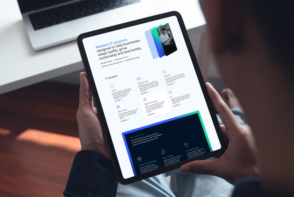 A visitor views the Secure Data Technologies website design on a tablet. The website is mobile responsive.