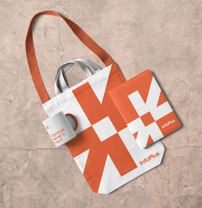 InfoPlus warehouse management system brand identity applied to a branded tote bag, mug and notebook