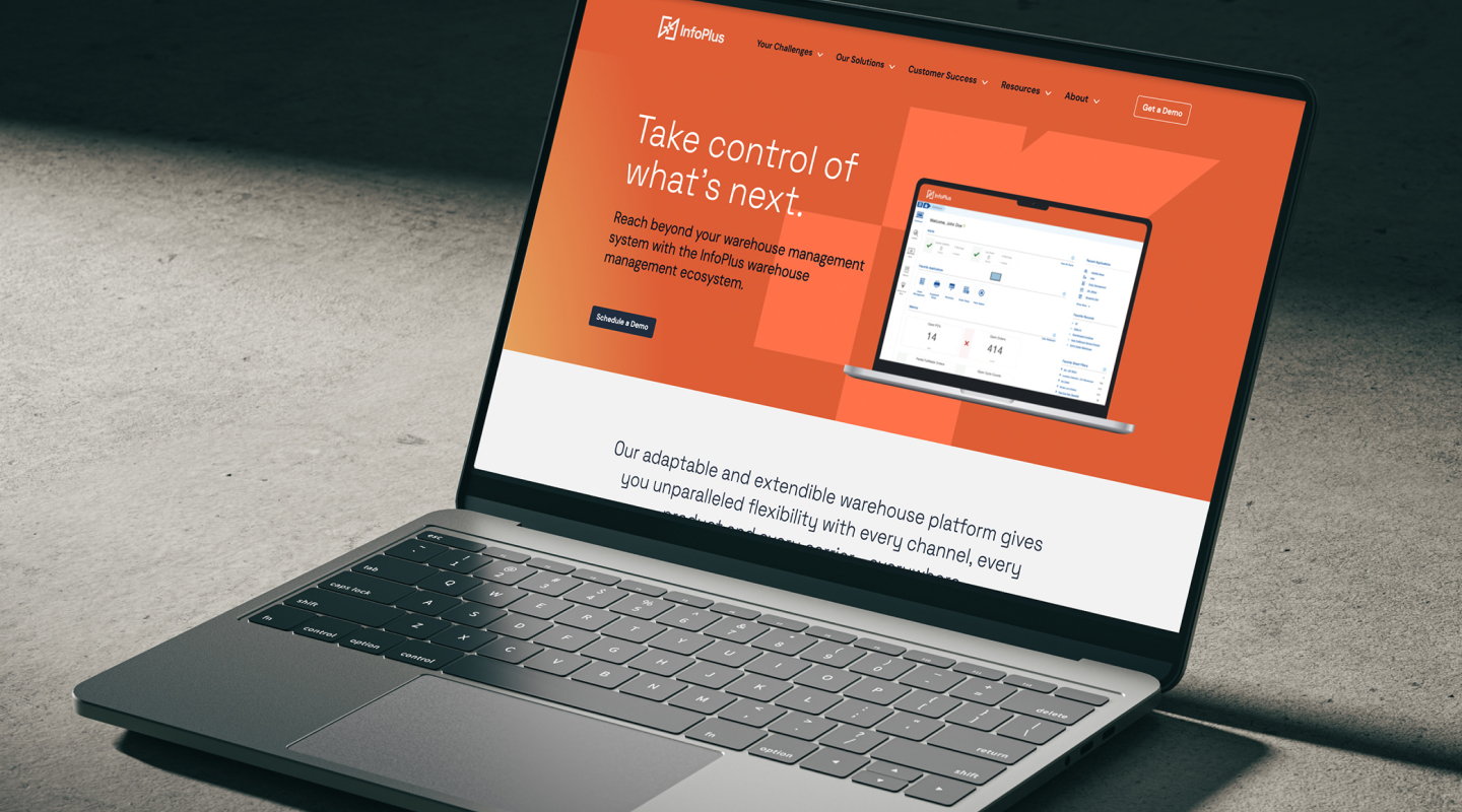 InfoPlus WMS website design on a laptop