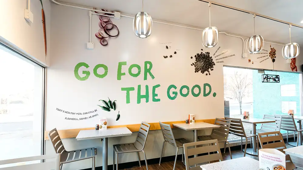 Interior branding for Crazy Bowls & Wraps fast casual restaurant