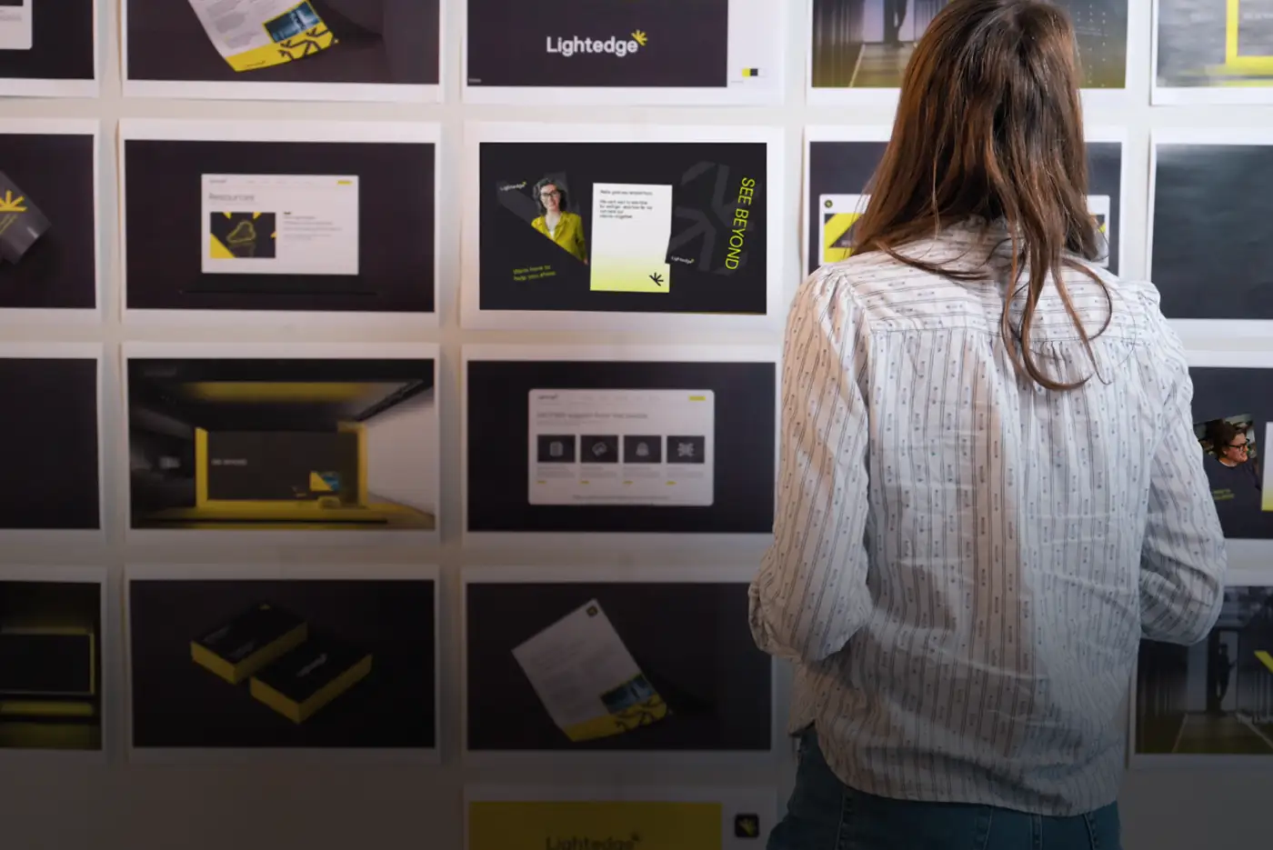 Atomicdust Creative Director reviews the teams branding work