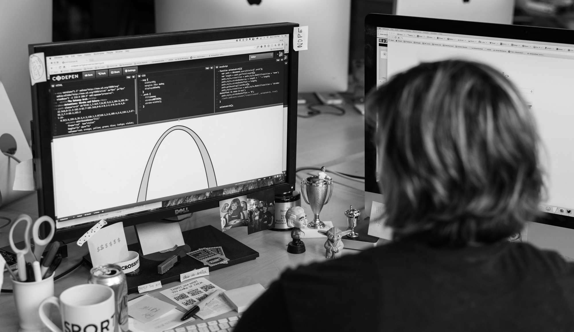 Developer coding the St. Louis Arch in SVG