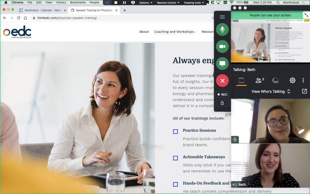 Atomicdust team members discuss the EDC website on a video call