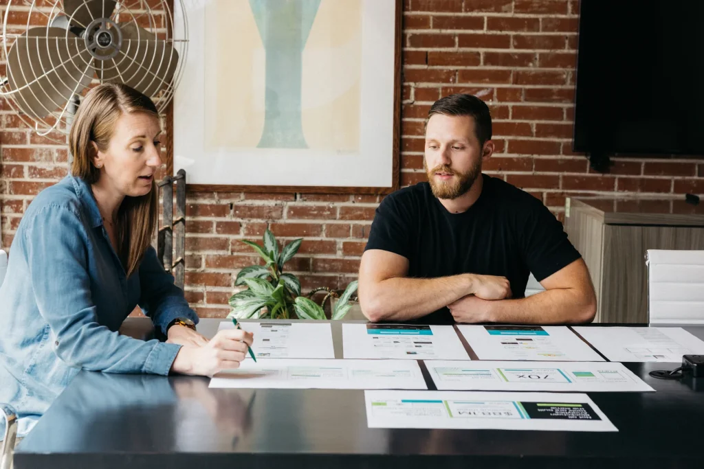 Atomicdust team reviewing marketing data and analytics together