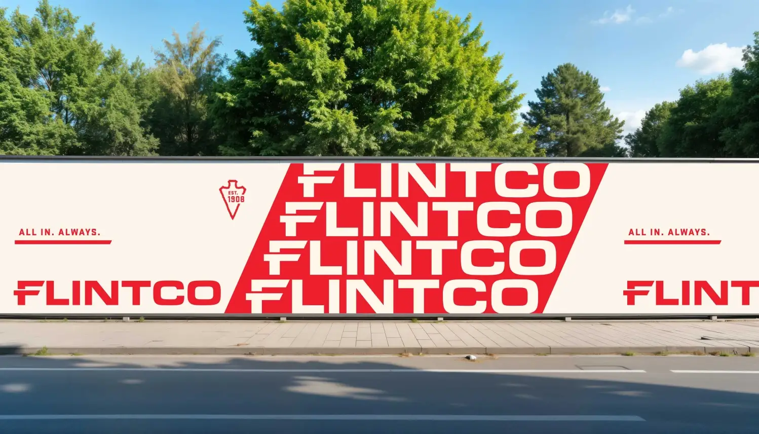 Branded construction site board featuring the Flintco logo and identity system