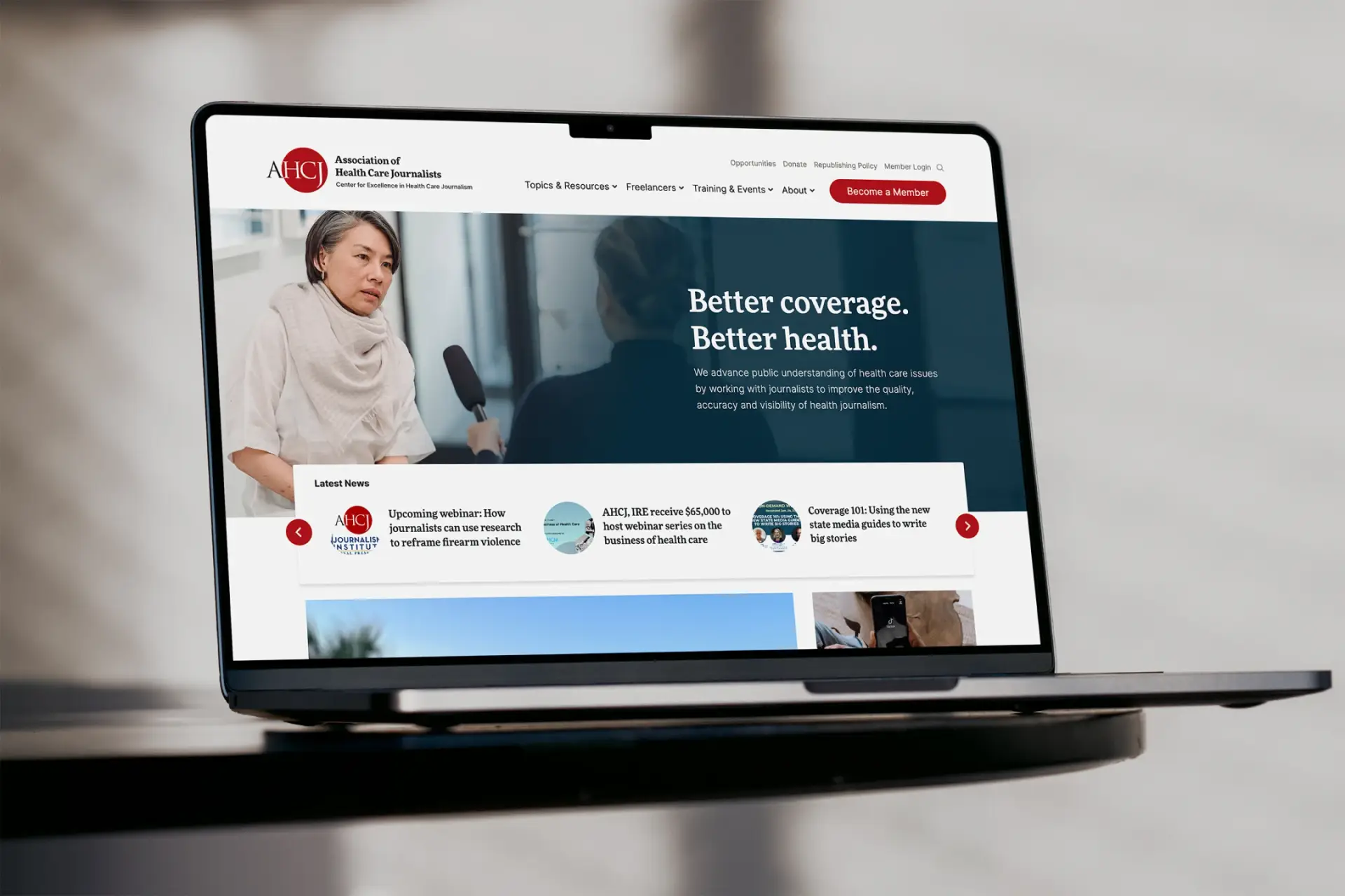 AHCJ website UX/UI design on a laptop.