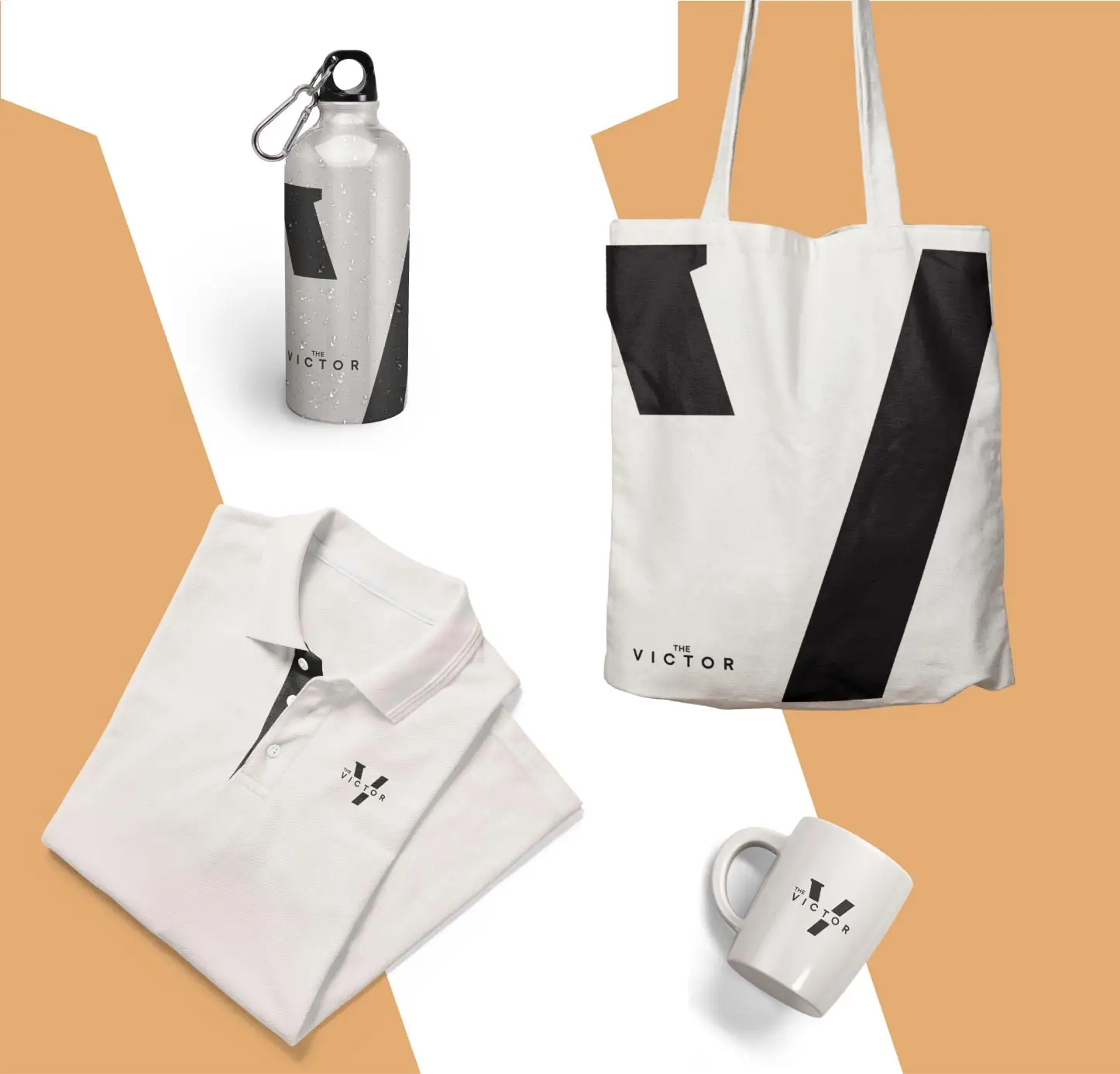 Items with The Victor branding, including a water bottle, polo, tote bag and coffee mug.