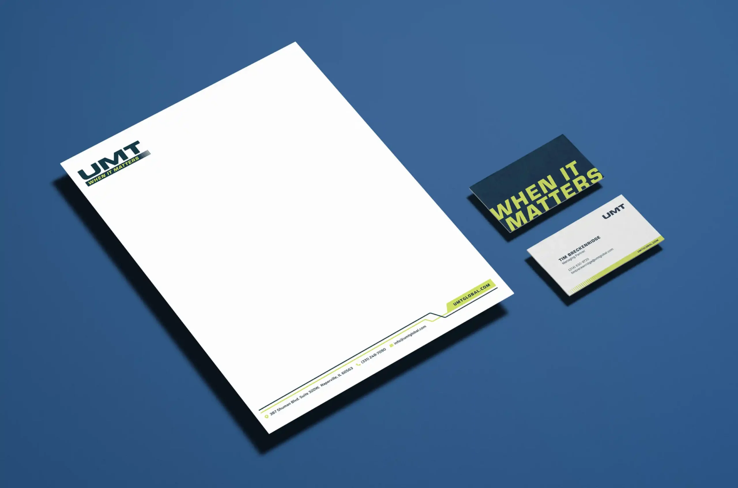 UMT letterhead and business cards featuring the new brand identity