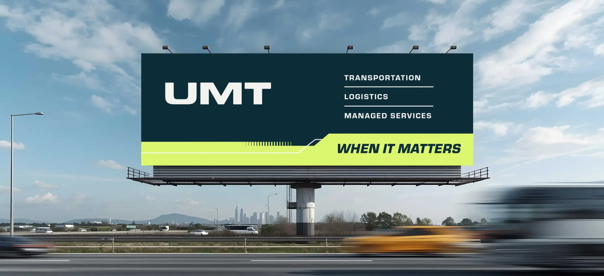 UMT billboard advertisement along a highway featuring the logo and “When It Matters” tagline