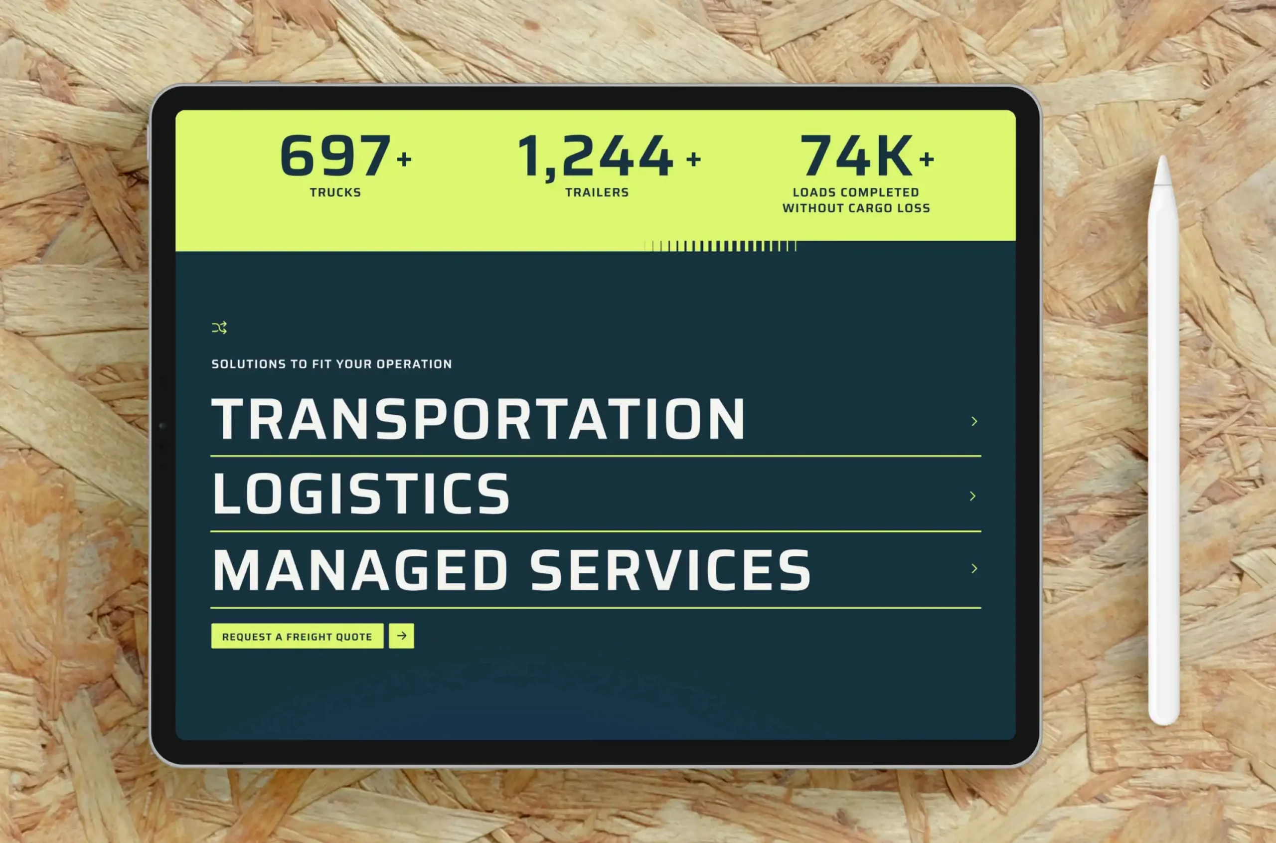 UMT website solutions page on a tablet, showing fleet statistics and transportation, logistics and managed services offerings
