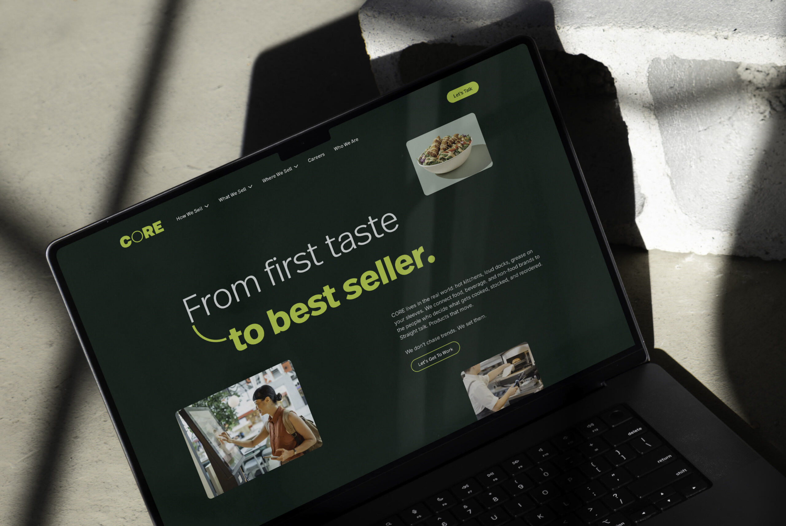 CORE website homepage on a laptop in natural light